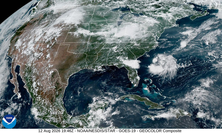 NOAA GOES-19 GeoColor satellite composite of the continental United States on August 12, 2026, showing the storm complex over the Ohio Valley