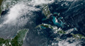 NOAA GOES GeoColor satellite image of Tropical Storm Arthur over the western Gulf of Mexico on June 17 2026, showing the storm's asymmetric structure with thunderstorm convection wrapping into Louisiana, Mississippi, and Alabama.