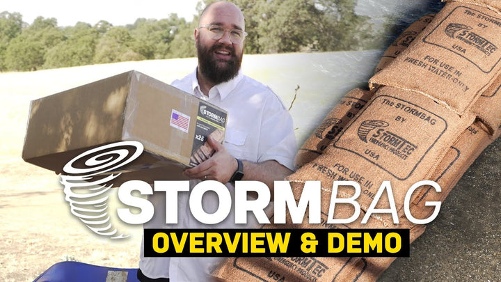 StormBag deployment demo video — sandless sandbag hydrating from flat to full barrier